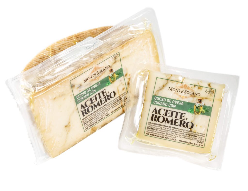 Queso de oveja curado artesano con aceite y romero Montesolano en formato de medio queso y cuña